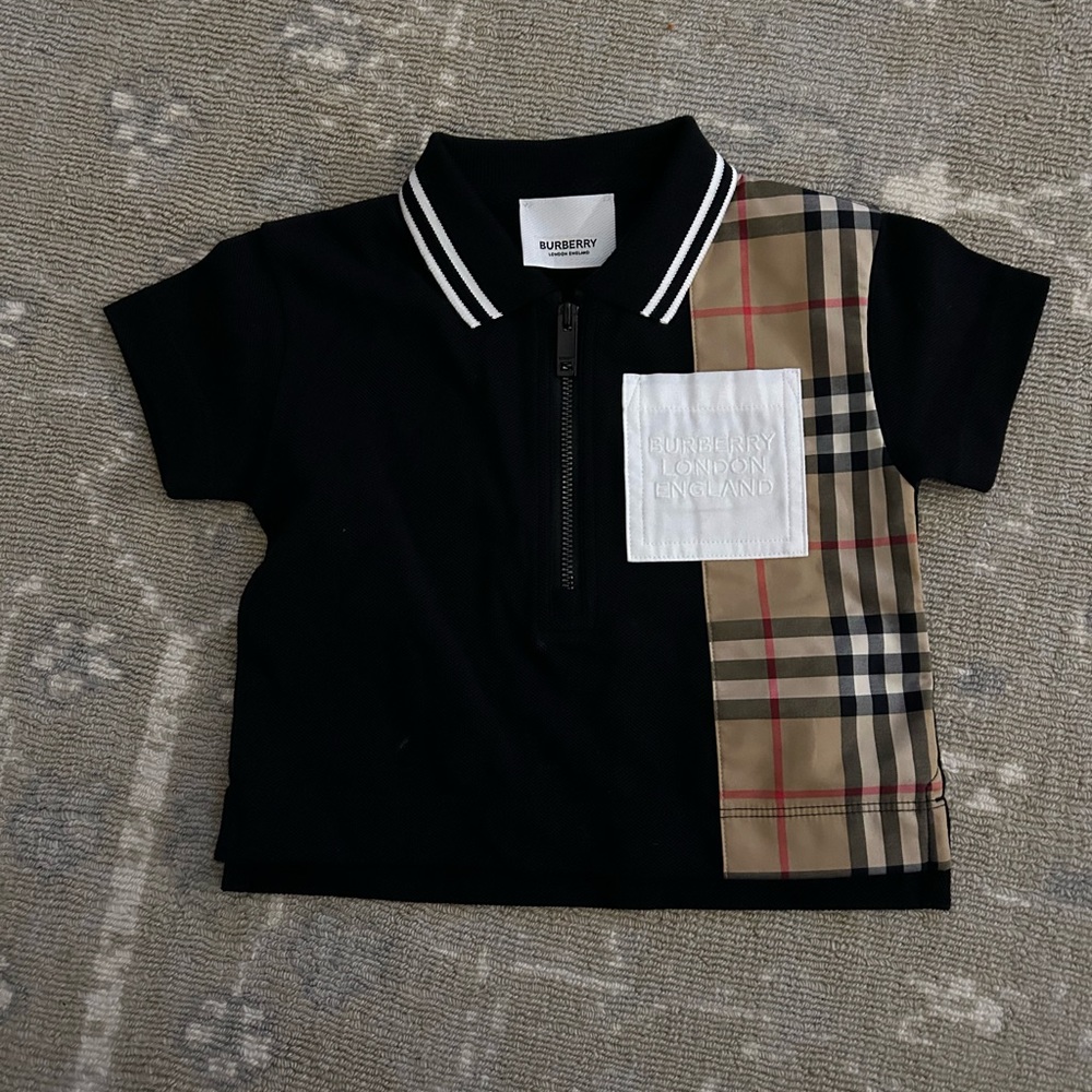 Burberry polo shirt.